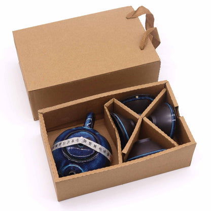 Teeservice – blaue Teekanne und vier Tassen