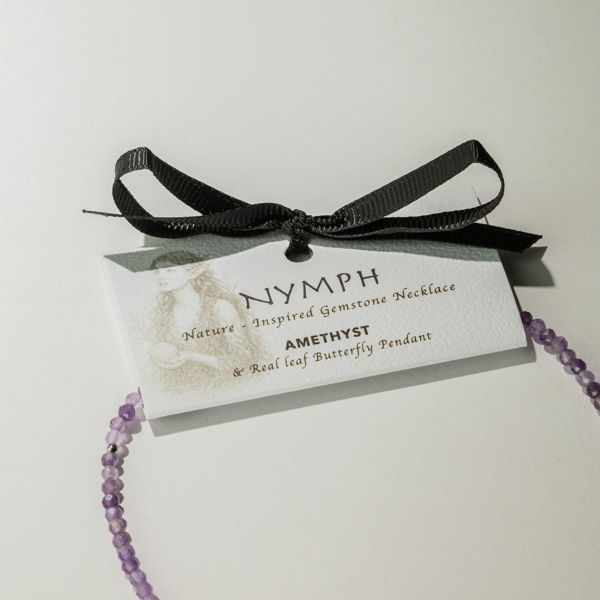 Nymphen-Mineralienkette mit Schmetterling – Amethyst.